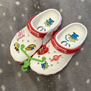 Toy Story Pizza Planet Crocs - New with tags, never worn - with 6 jibbitz